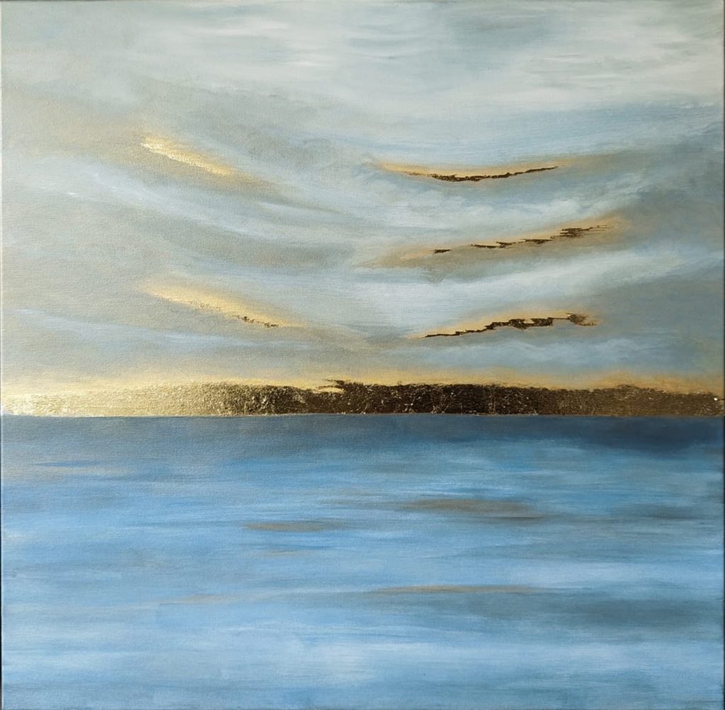 paysage de mer le soir or et bleu